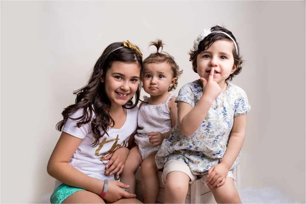 Acute Lymphoblastic Leukemia child with sisters photo by The Gold Hope Project