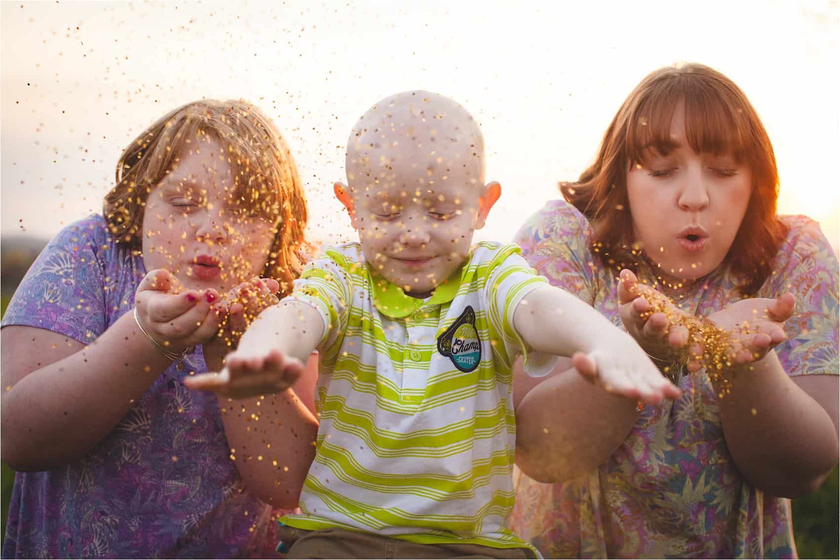 Photo sessions cancer patients siblings with glitter photo by The Gold Hope Project