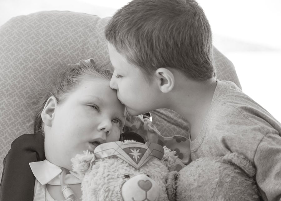 photo of siblings kissing photo for The Gold Hope Project